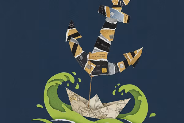 Collage of an anchor made of credit cards dragging down a paper boat